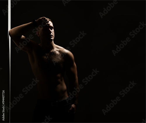Closeup portrait of sexy handsome topless male model  © Dmitry Lobanov