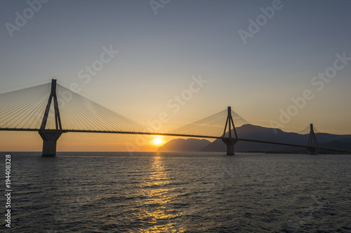 Rio antirrio suspended bridge at sunset in Greece