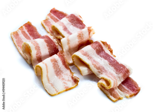 Bacon slices on white background.