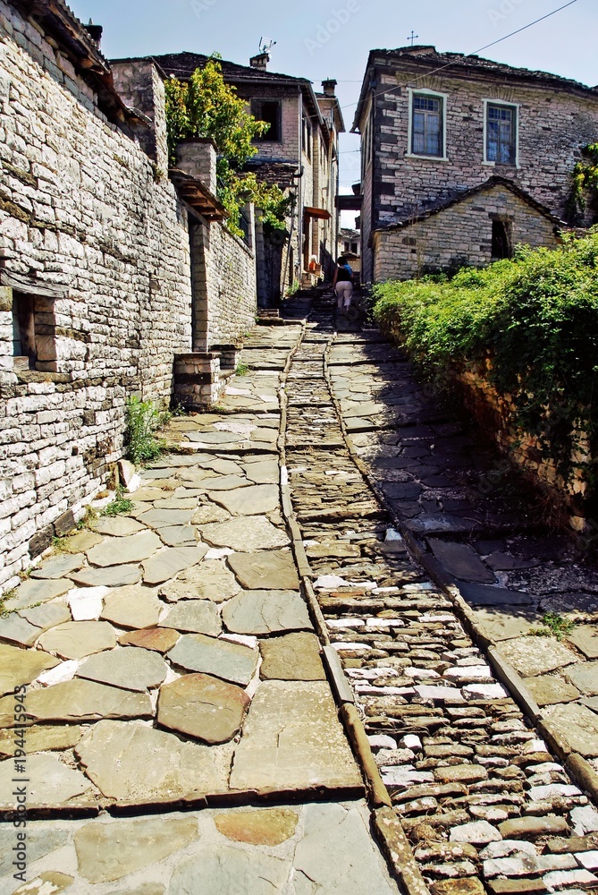 Stone walkway in the traditional village of Dilofo. Central Zagori, Zagoria area, Epirus region, north-western Greece.