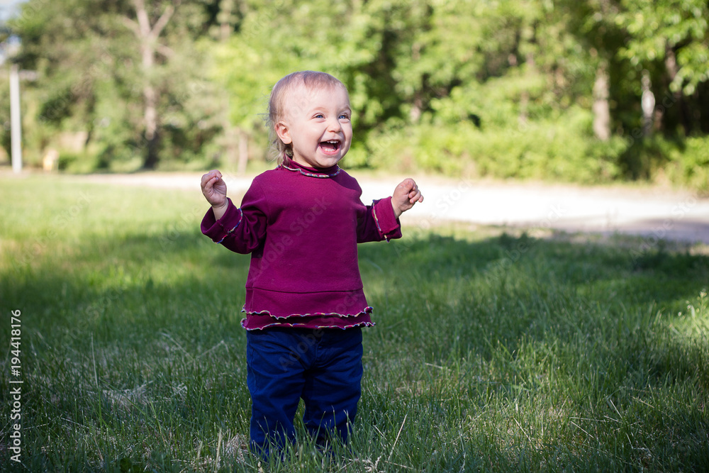 Happy little girl having fun at the park Happy little girl having fun at the park