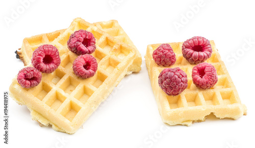 Traditional waffle (Belgian) with fresh red raspberries isolated on white background three sweet delicate airy.