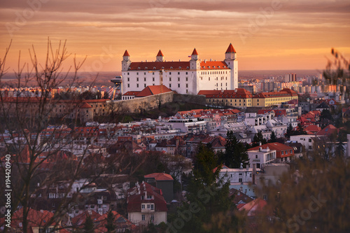 Bratislava castle in orange sunset light. Old historical town Slovakia