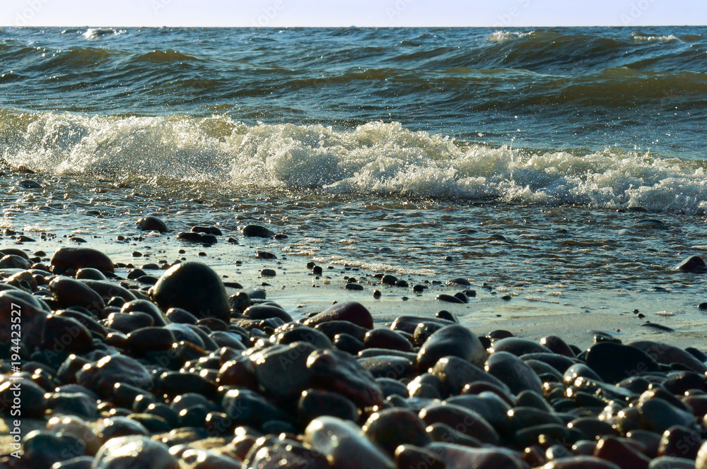 Sea coast. Waves and storms at sea. Waves on the Baltic Sea.