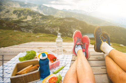 Legs of traveler couple