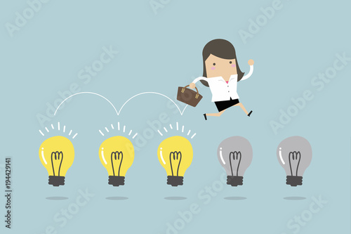 Businesswoman jump on light bulbs. vector