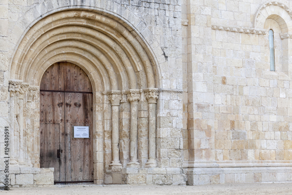 Fototapeta premium Romanesque church of Santa Maria, historic monument in Penedes area, Sant Marti Sarroca, Spain.