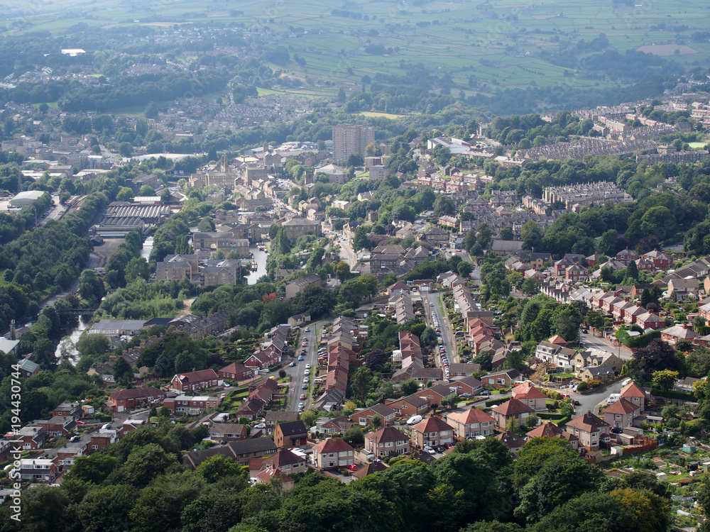 panoramic aerial view of the town of halifax in west yorkshire with roads streets houses and surrounding pennine landscape