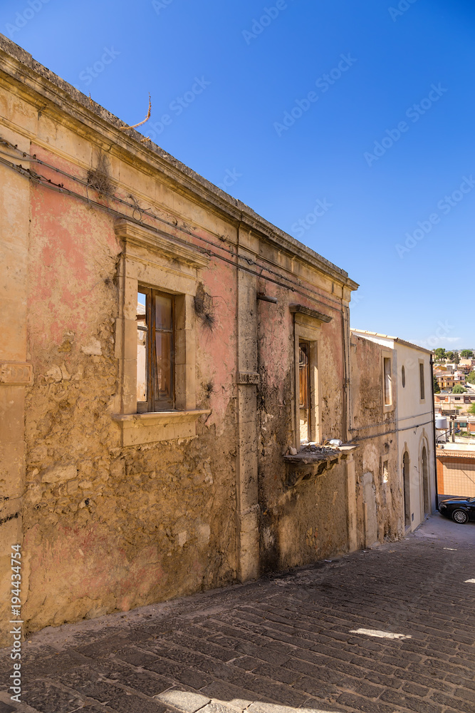 Noto, Sicily, Italy. Ancient buildings on one of the streets of the historic center