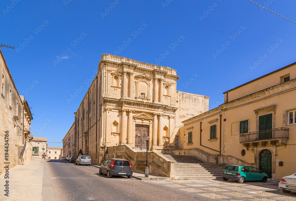 Noto, Sicily, Italy. The buildings of the XVIII century from the yellow stone in the historical center