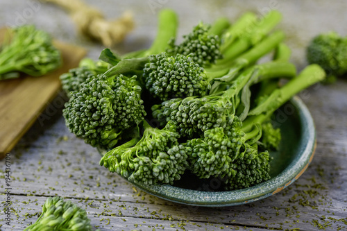 stems of broccolini on a table photo