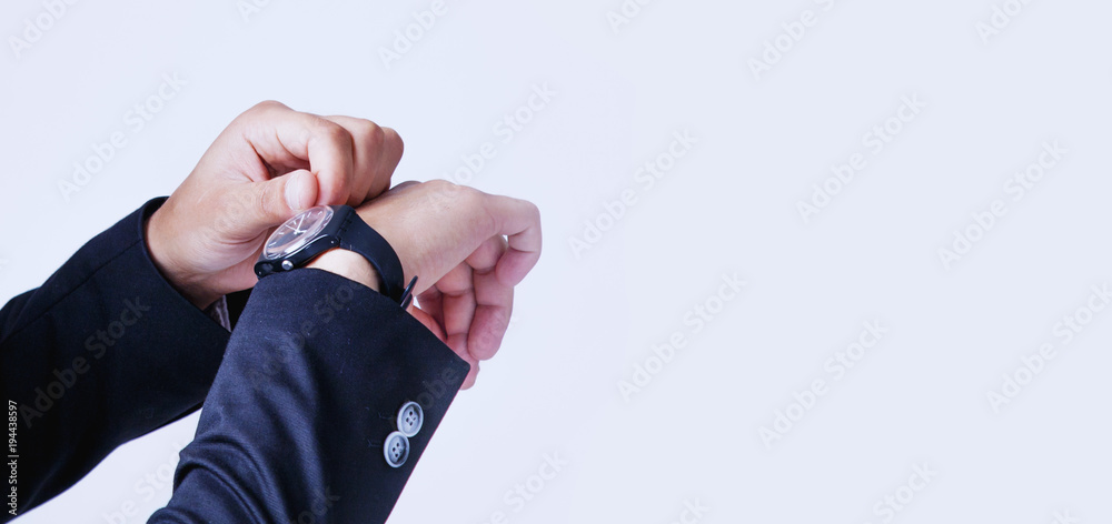 Fototapeta premium Time to work! Businessman checking time on his wrist watch (work, responsibility, success, timemanagement concept)