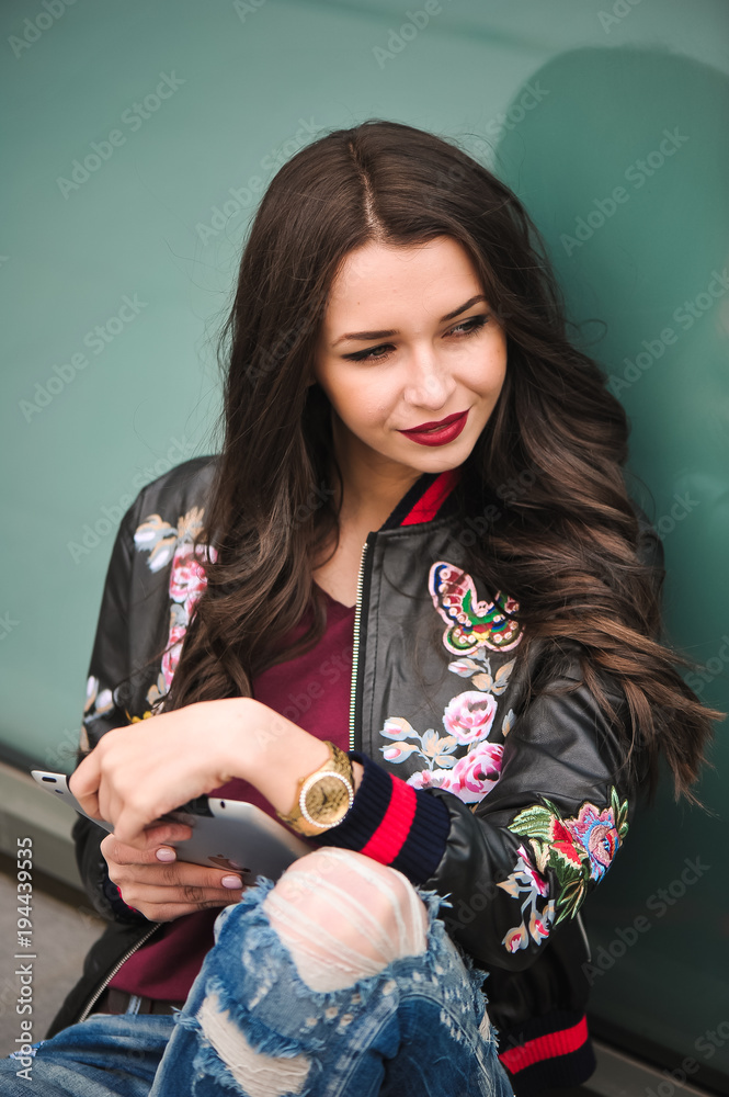 pretty women using tablet, outdoor portrait, internet, text, touch screen, close up pretty young girl posing in the street with tablet pretty women using tablet, outdoor portrait, internet, text, touch screen, close up pretty young girl posing in the street with tablet