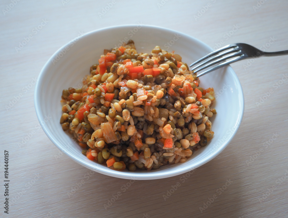 Risotto with mung beans, rice and vegetables.
Risotto with mung beans, rice and vegetables.