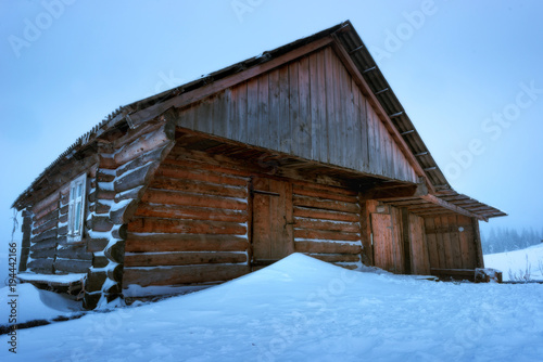 The wooden house is winter