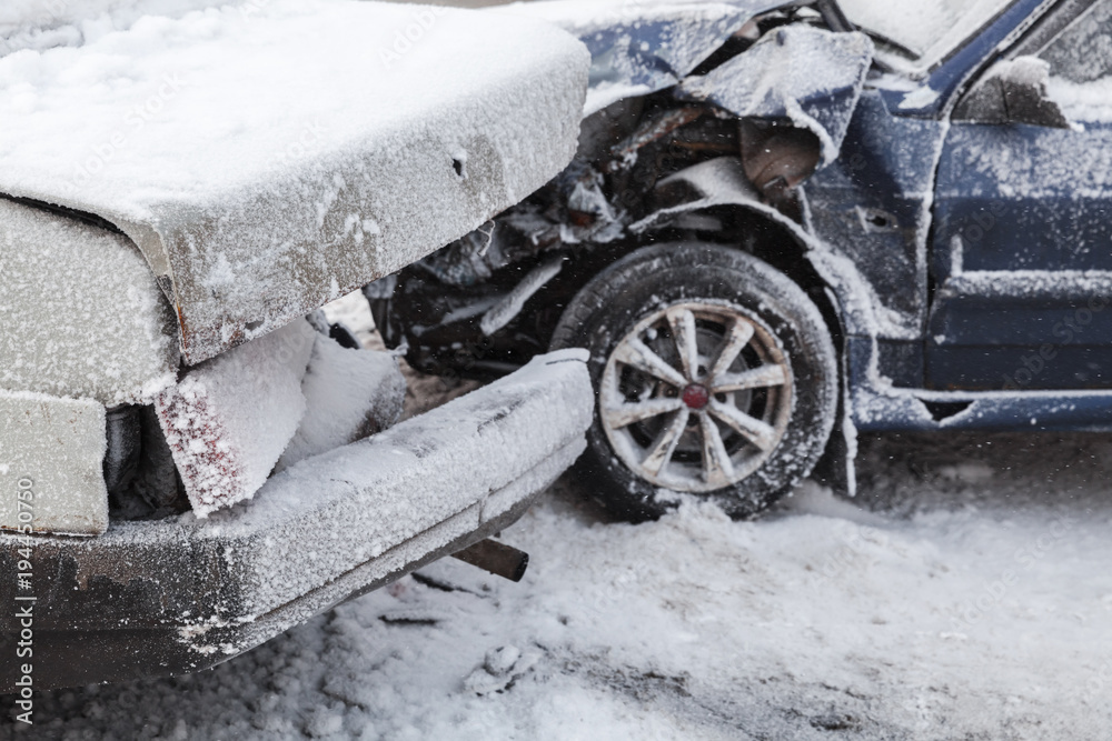 Car crash accident on winter snowy road