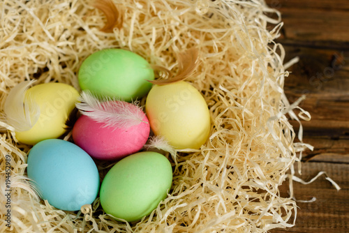 Easter eggs in the nest. It can be used as a background