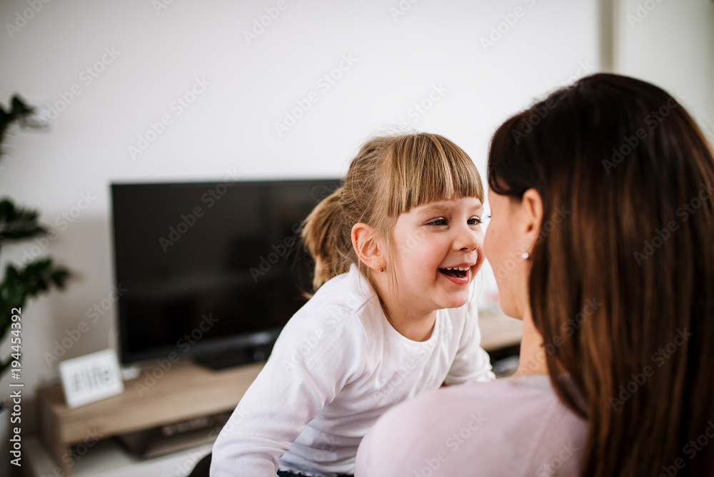 Family time. Little girl and her mother spendng time together at home. Family time. Little girl and her mother spendng time together at home.
