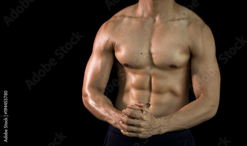 Close up bodybuilder muscular beautiful body on copy space background