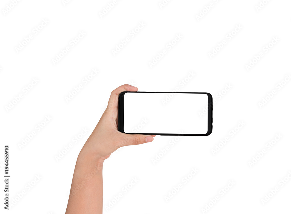 Hand holding cell phone blank on white screen and white background Hand holding cell phone blank on white screen and white background
