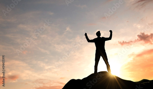 Business success. Silhouette of a man celebrating success at the top of a mountain. 3D Rendering