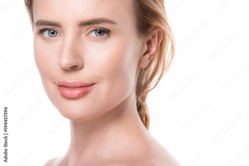 Smiling female with fresh clean skin isolated on white Smiling female with fresh clean skin isolated on white