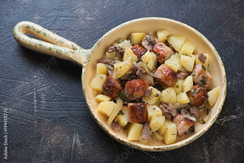 Bild auf Leinwand Portion of Dublin coddle or traditional Irish potato, sausage and bacon stew, da