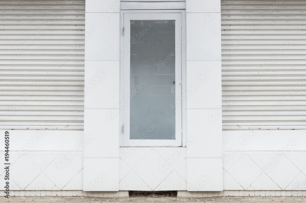 sidewalk by street wall & door sidewalk by street wall & door