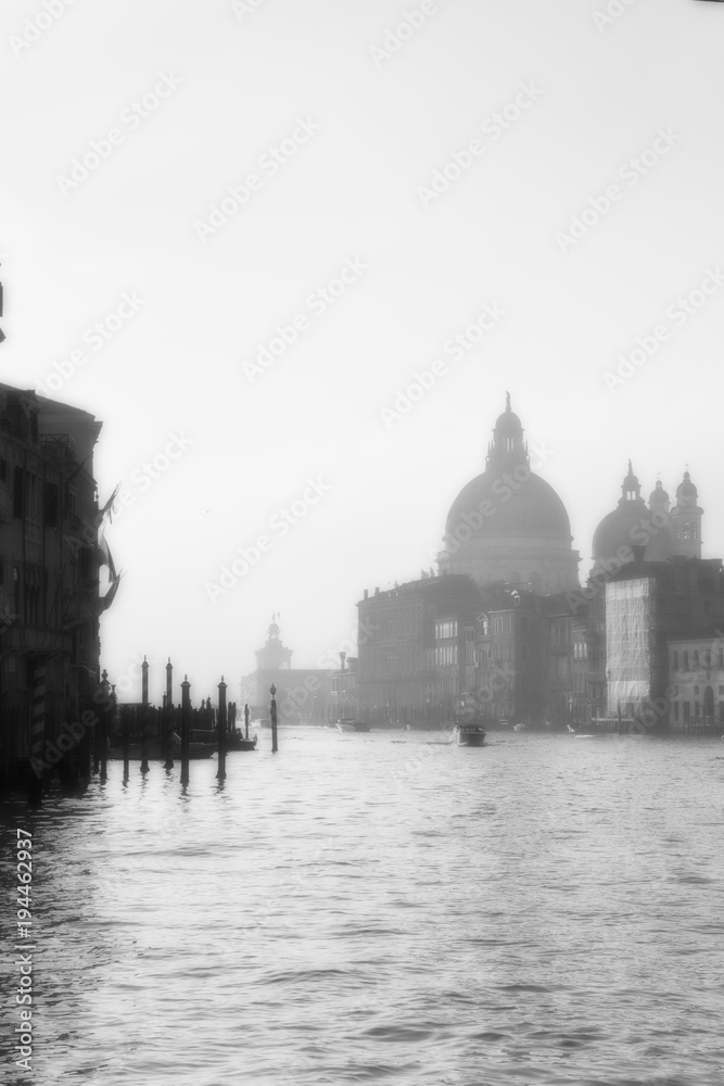 Naklejka premium Buildings in Venice along the Grand Canal in the Morning with fog.