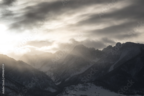 Sun peaking through mountains © Erik