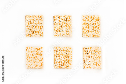 Jewish matza on white background, flat lay, top view.