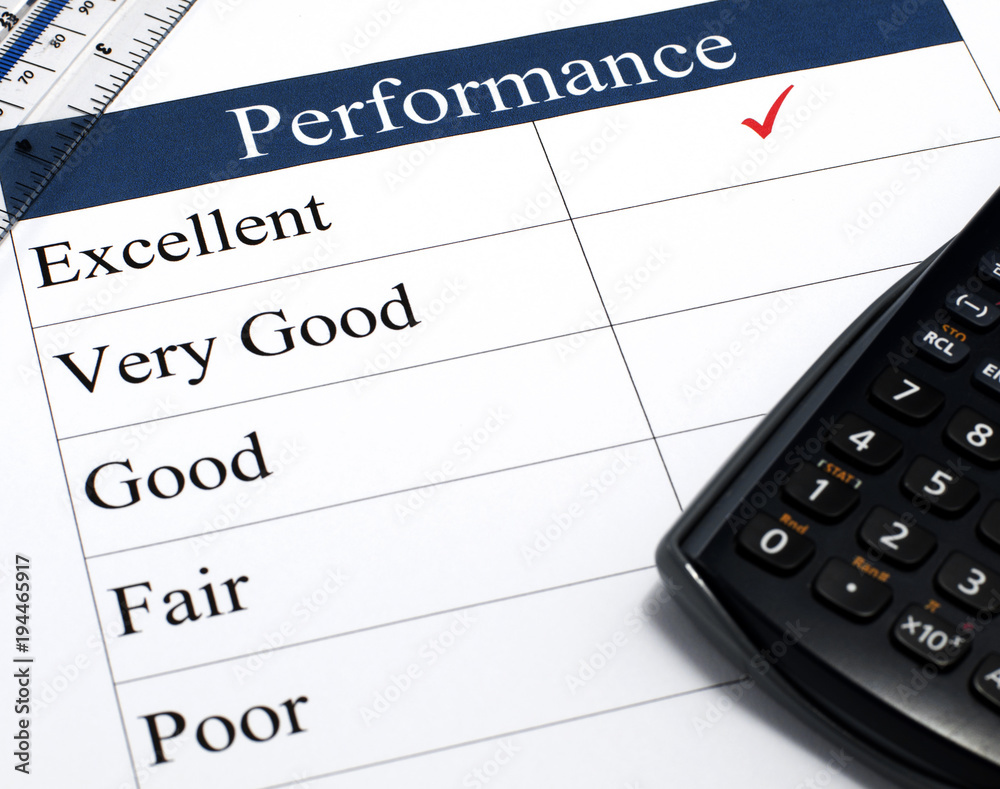 Performance Assessment form with a calculator and ruler and a tick indicating excellent. Performance Assessment form with a calculator and ruler and a tick indicating excellent.