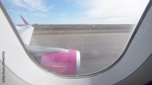 Taking off on runway leaving Iceland photo