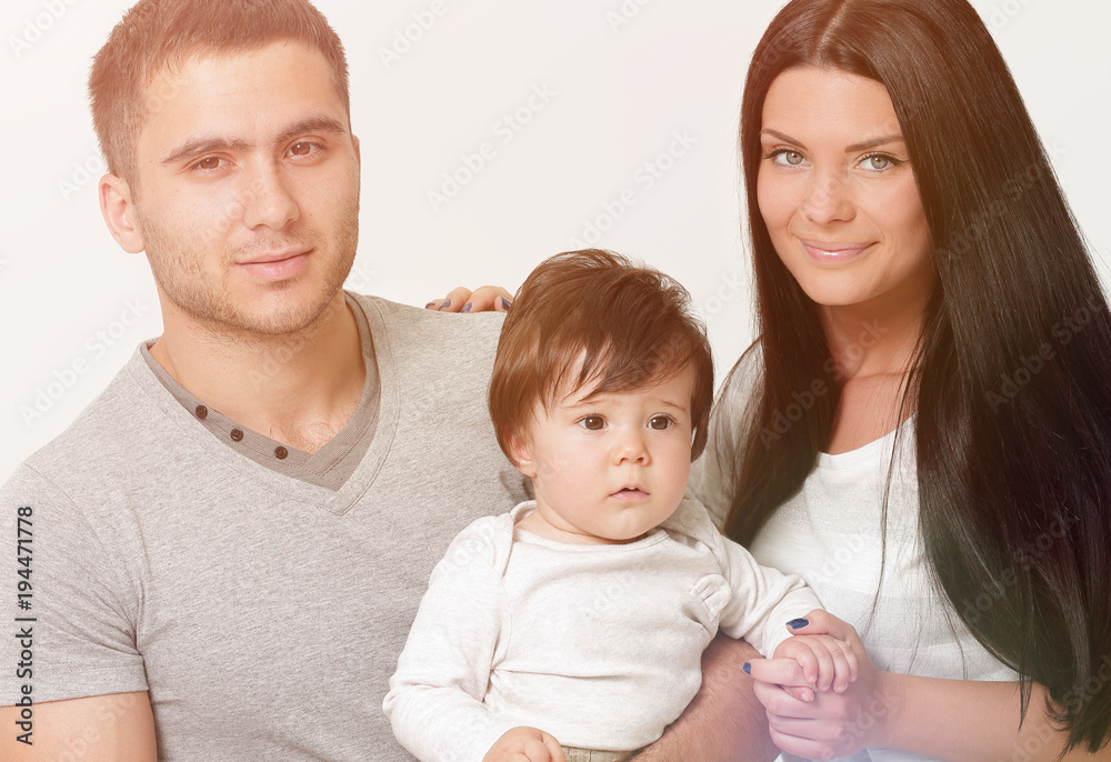 bright portrait of happy family. isolated on white background bright portrait of happy family. isolated on white background
