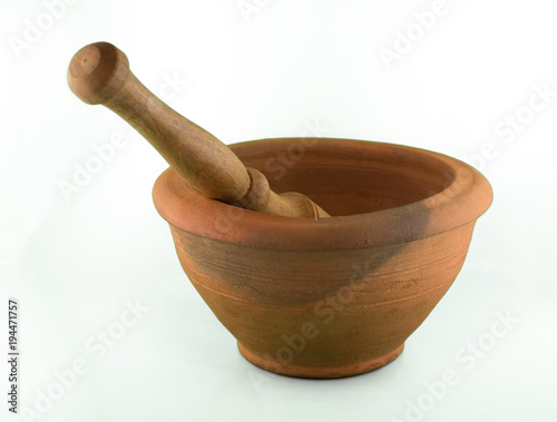 clay pot, grind the coffee beans. isolated background