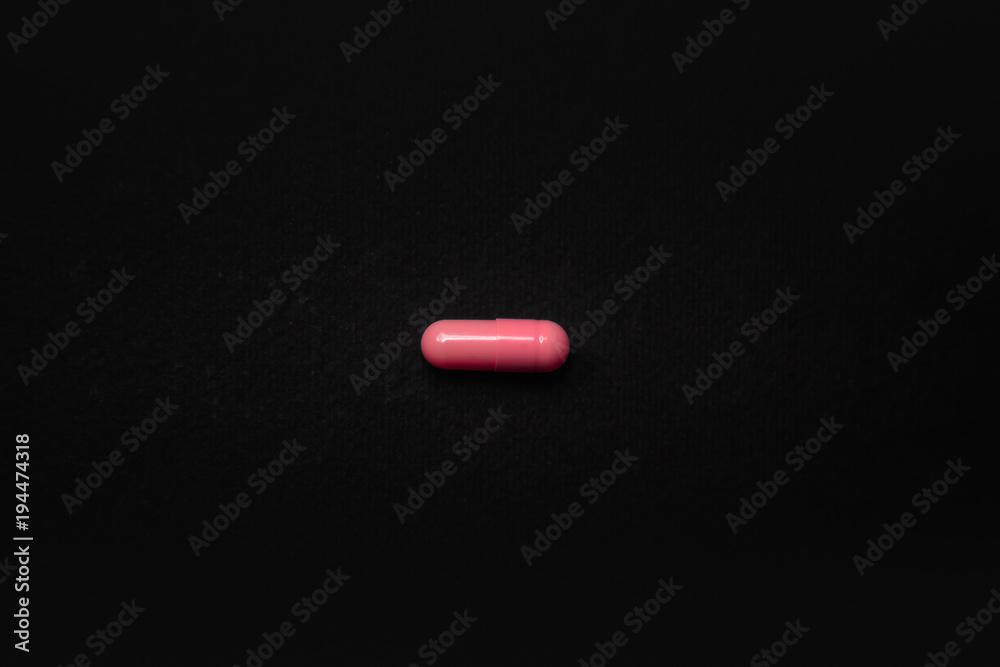 pink pill capsule medicinal drug isolated on white background pink pill capsule medicinal drug isolated on white background