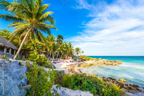 Recreation at paradise beach resort with turquoise waters of Caribbean Sea at Tulum  close to Cancun  Riviera Maya  tropical destination for vacation  Mexico