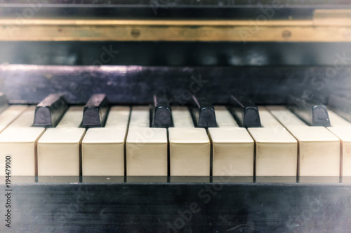 Pianoforte, front view instrument, musical instrument. learn to play the instrument at home. white large piano. piano keyboard. concert concept. photo