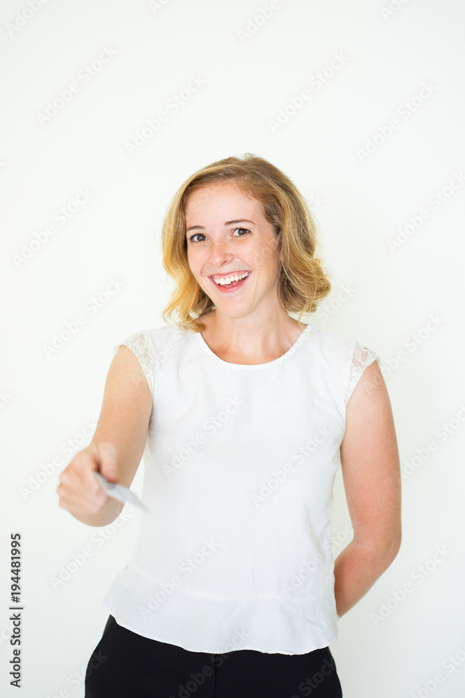 Fototapeta premium Smiling Cute Young Woman Offering Plastic Card