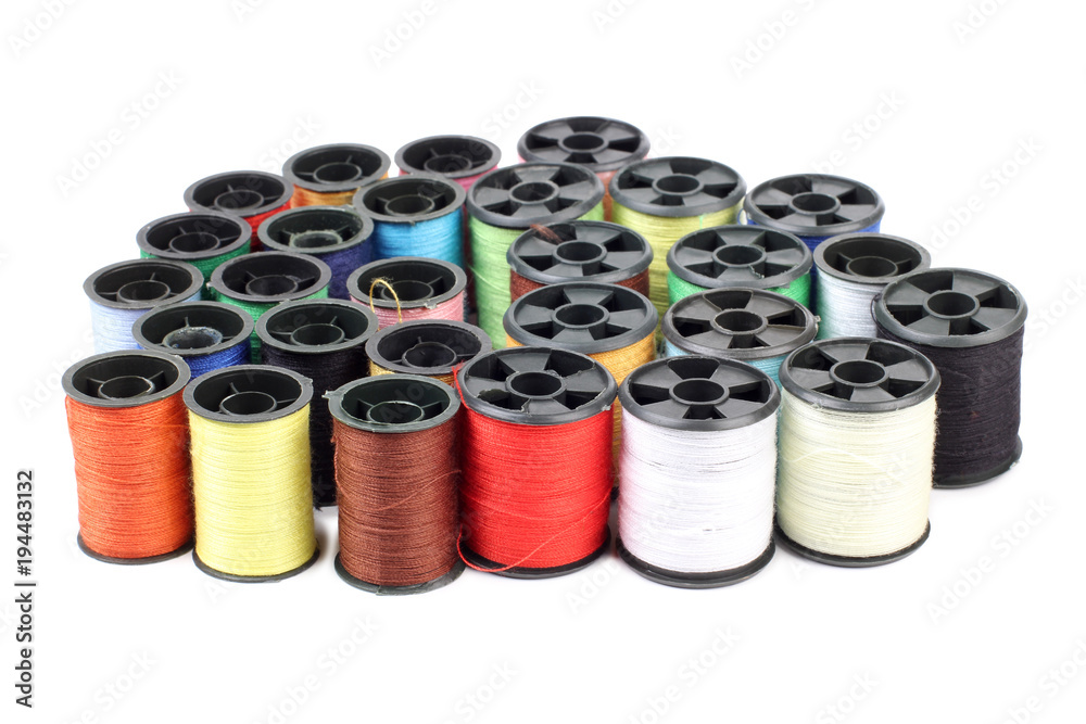 Coils with multi-colored threads on a white background Coils with multi-colored threads on a white background