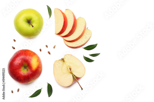 green and red apples with slices isolated on white background. top view