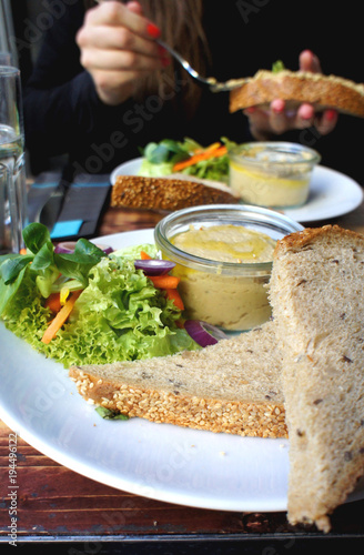 Beautiful portion of hummus and salad