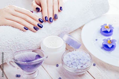 Beautiful blue manicure with spa essentials