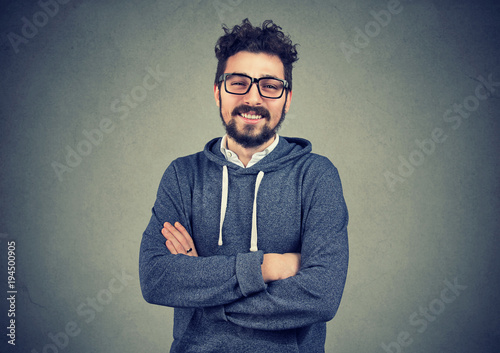 Casual handsome man smiling at camera