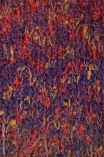 Knitted background. Knitted texture. Knitting pattern of wool. Knitting. Background. © Alla