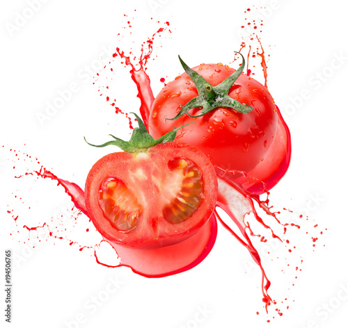 tomatoes in juice splash isolated on a white background