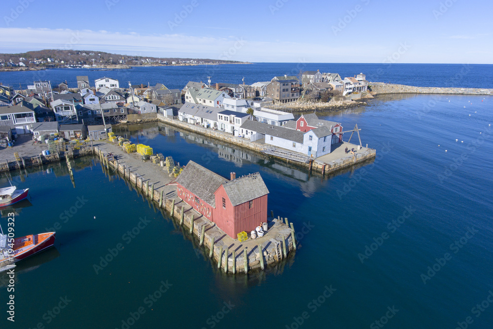 Rockport Harbor and Motif Number 1 aerial view in Rockport, Massachusetts, USA. This building is a fishing shack built in 1840, and now is the the most famous symbol of New England maritime life. Rockport Harbor and Motif Number 1 aerial view in Rockport, Massachusetts, USA. This building is a fishing shack built in 1840, and now is the the most famous symbol of New England maritime life.