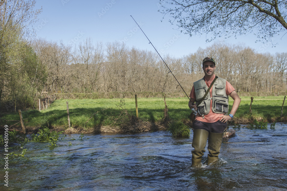 sport fisherman in river, Galicia, Spain. sport fisherman in river, Galicia, Spain.
