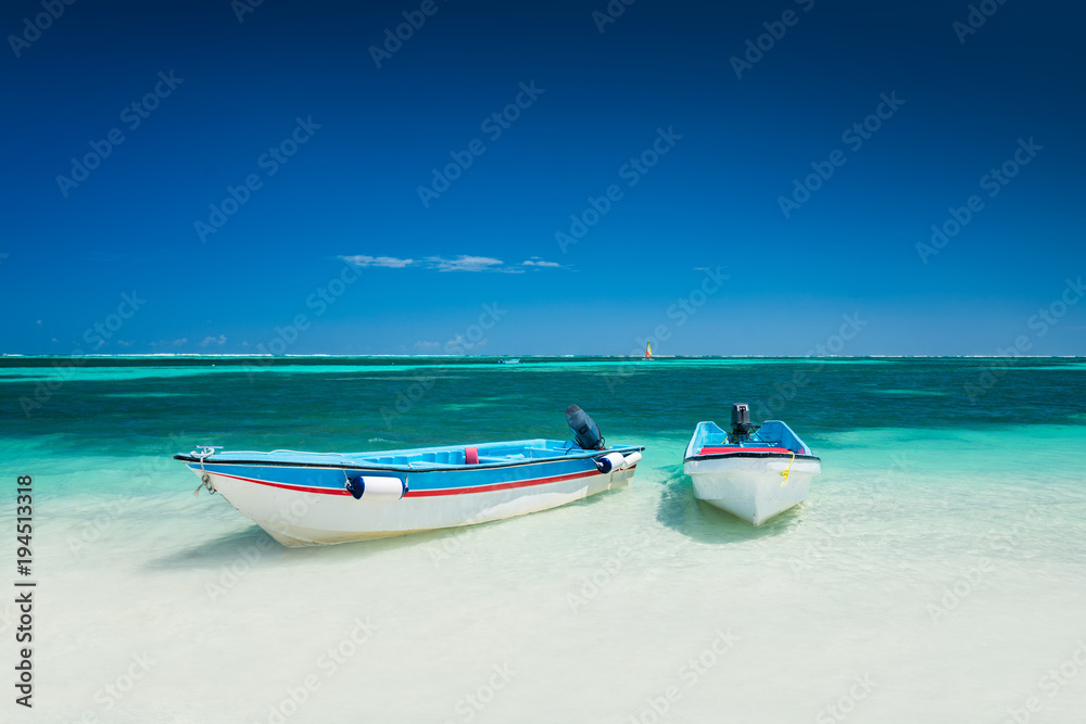 Carribean sea and speed boat for trip adventure on the beach