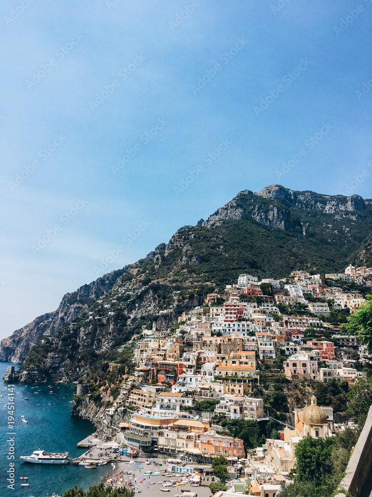 Very beautiful photo with a view of Positano, colorful houses and beautiful blue Mediterranean Sea. Amalfi coast
